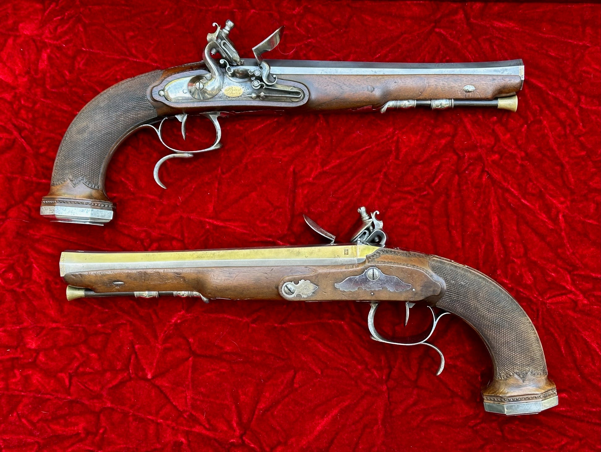 Cased pair of flintlock pistols with accessories Boutet
